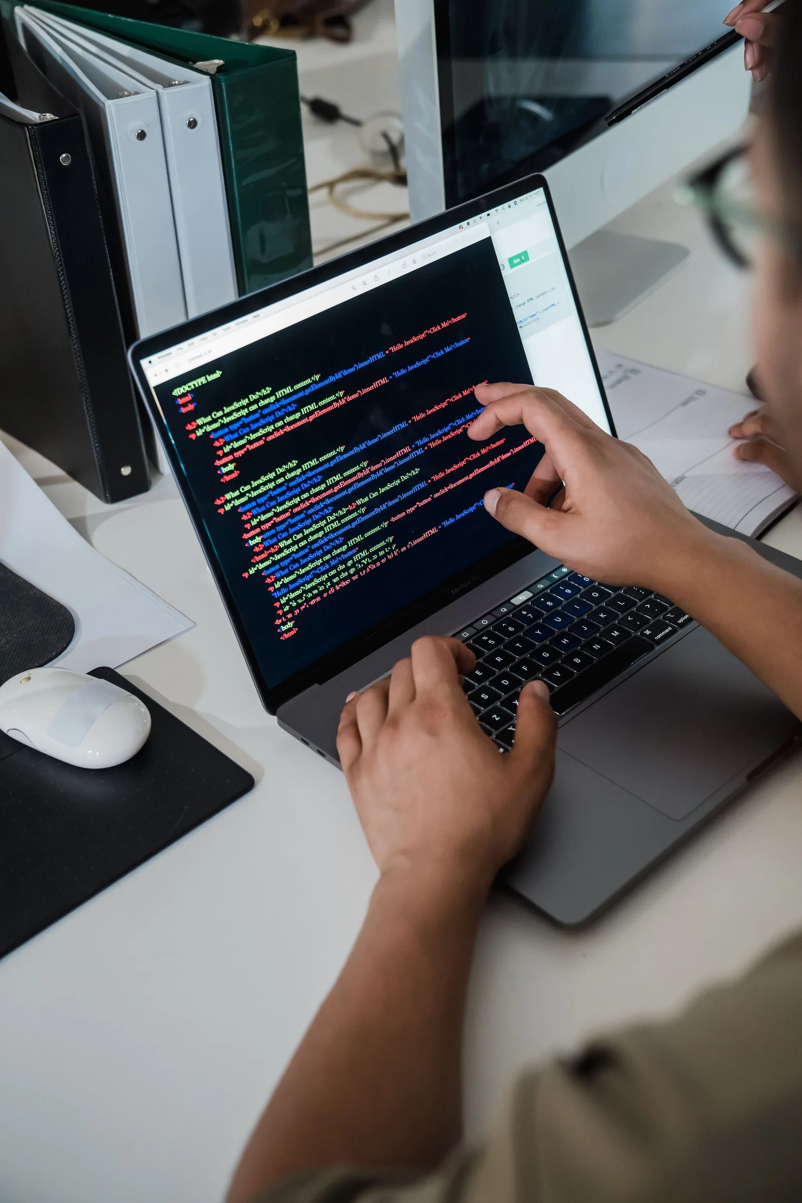 Code displayed on a laptop